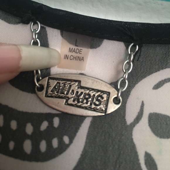 Skull black and white see-through with spikes - Picture 5 of 7